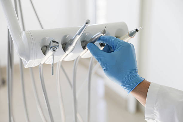 Professional Root Canal Treatment technician working in Justin, TX